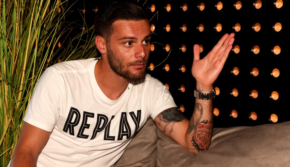 A generic square placeholder image with rounded corners in a figure.