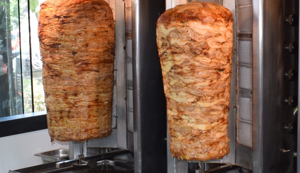 A generic square placeholder image with rounded corners in a figure.