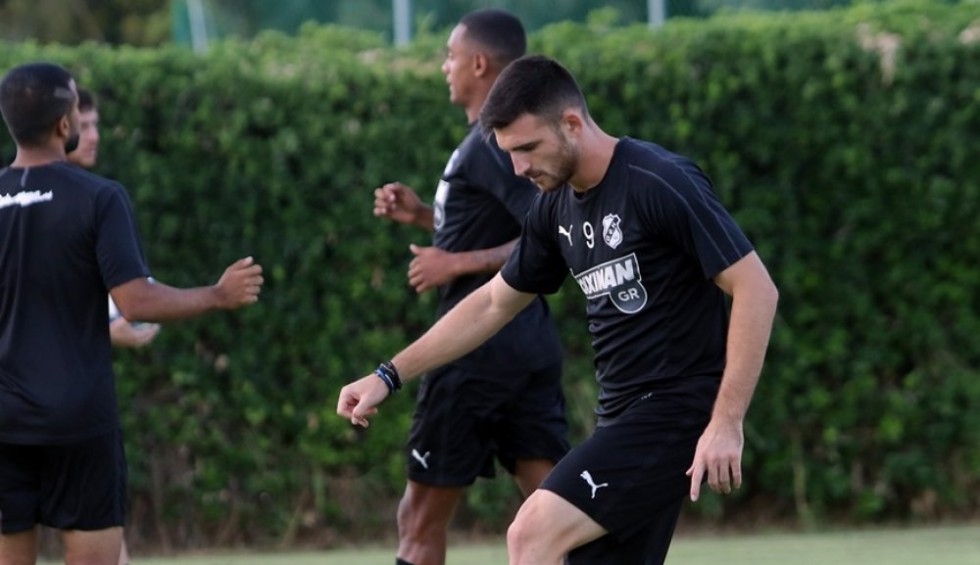 A generic square placeholder image with rounded corners in a figure.