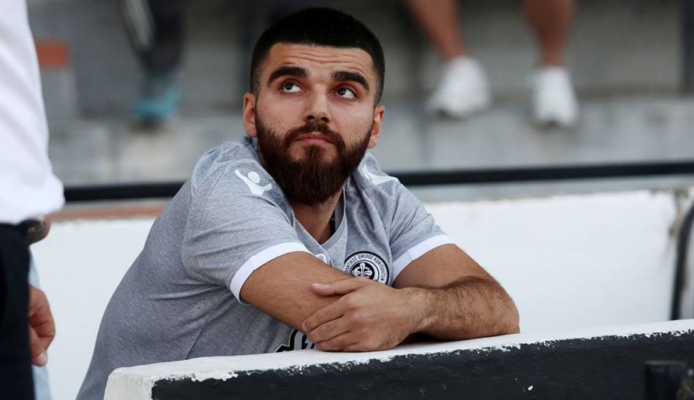 A generic square placeholder image with rounded corners in a figure.