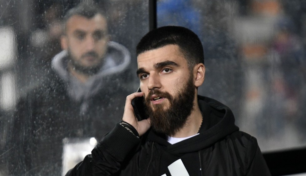 A generic square placeholder image with rounded corners in a figure.