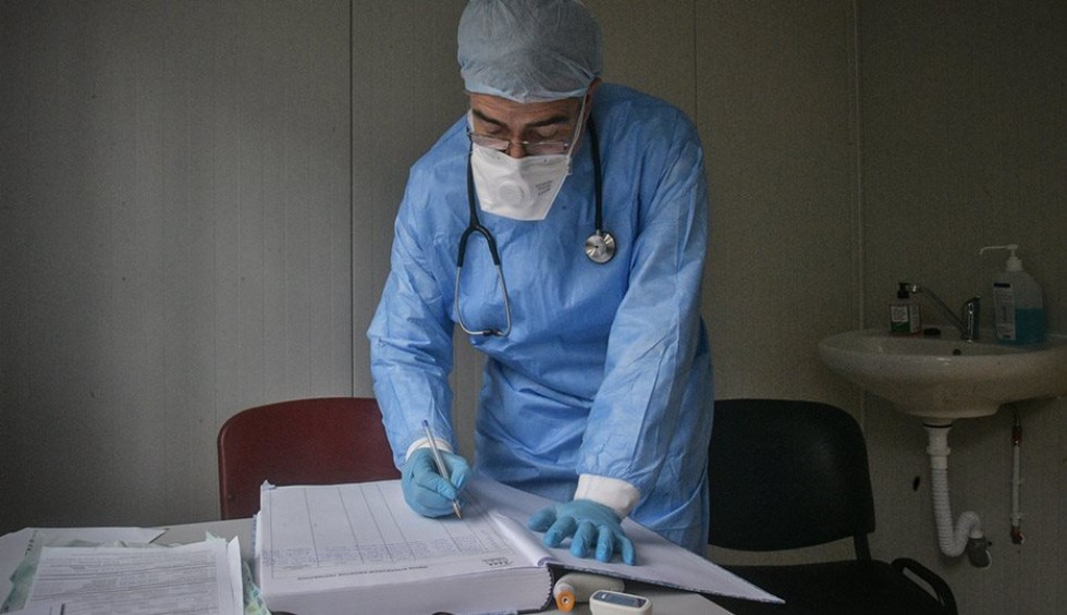 A generic square placeholder image with rounded corners in a figure.