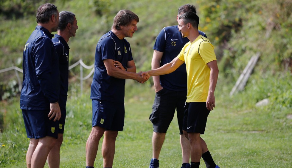 A generic square placeholder image with rounded corners in a figure.