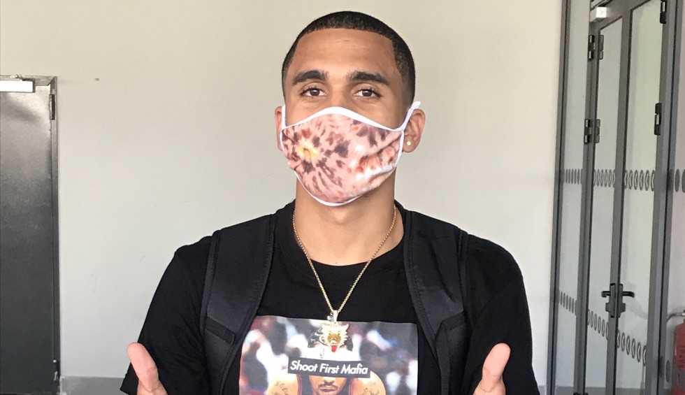 A generic square placeholder image with rounded corners in a figure.