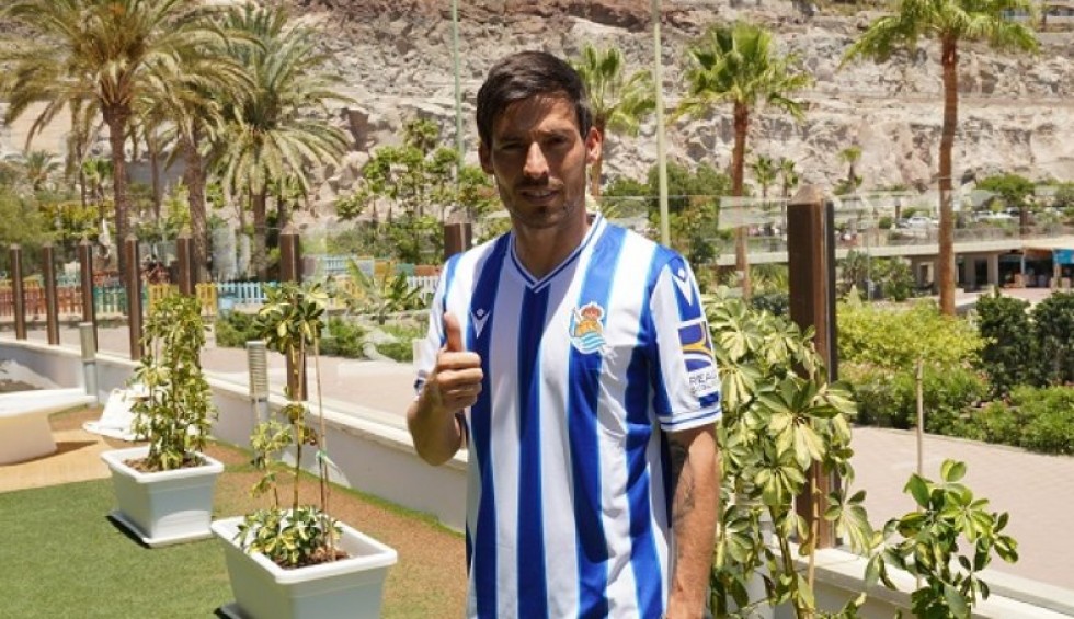 A generic square placeholder image with rounded corners in a figure.