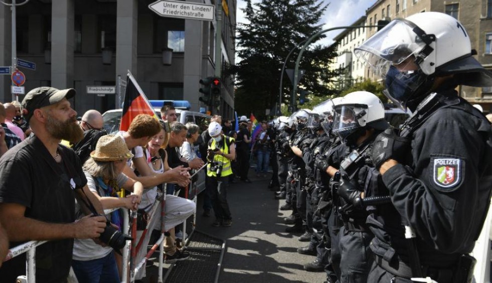 A generic square placeholder image with rounded corners in a figure.