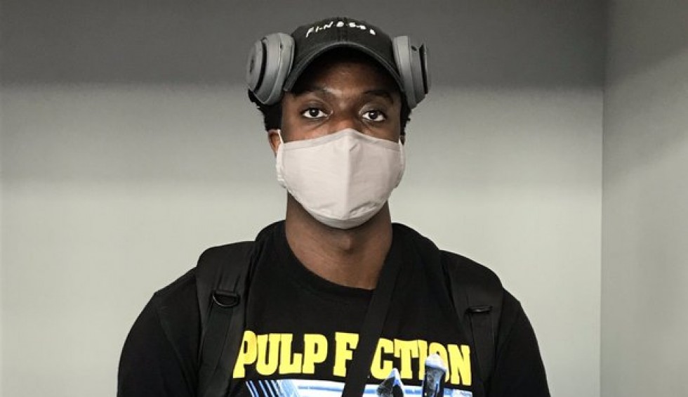 A generic square placeholder image with rounded corners in a figure.