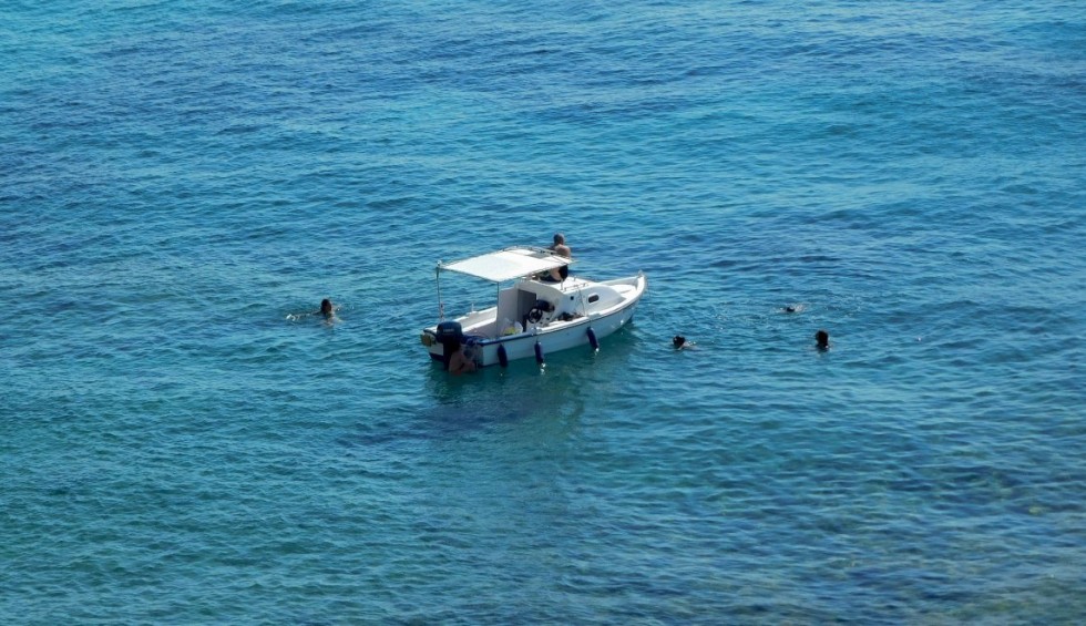 A generic square placeholder image with rounded corners in a figure.