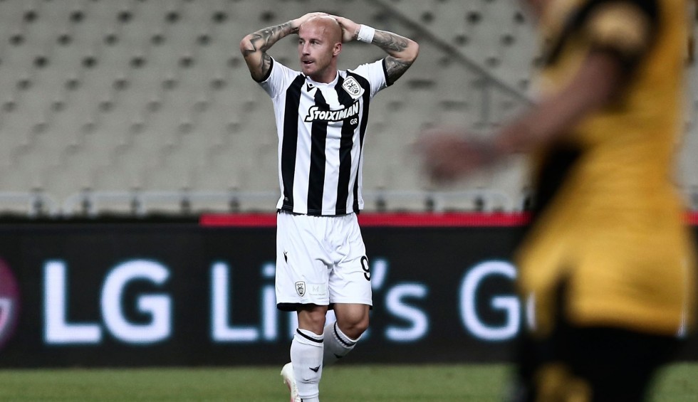 A generic square placeholder image with rounded corners in a figure.