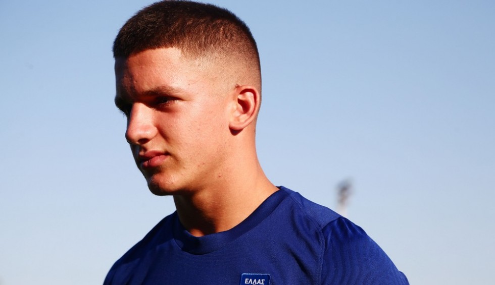 A generic square placeholder image with rounded corners in a figure.