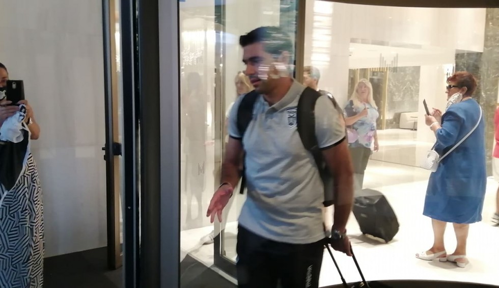 A generic square placeholder image with rounded corners in a figure.