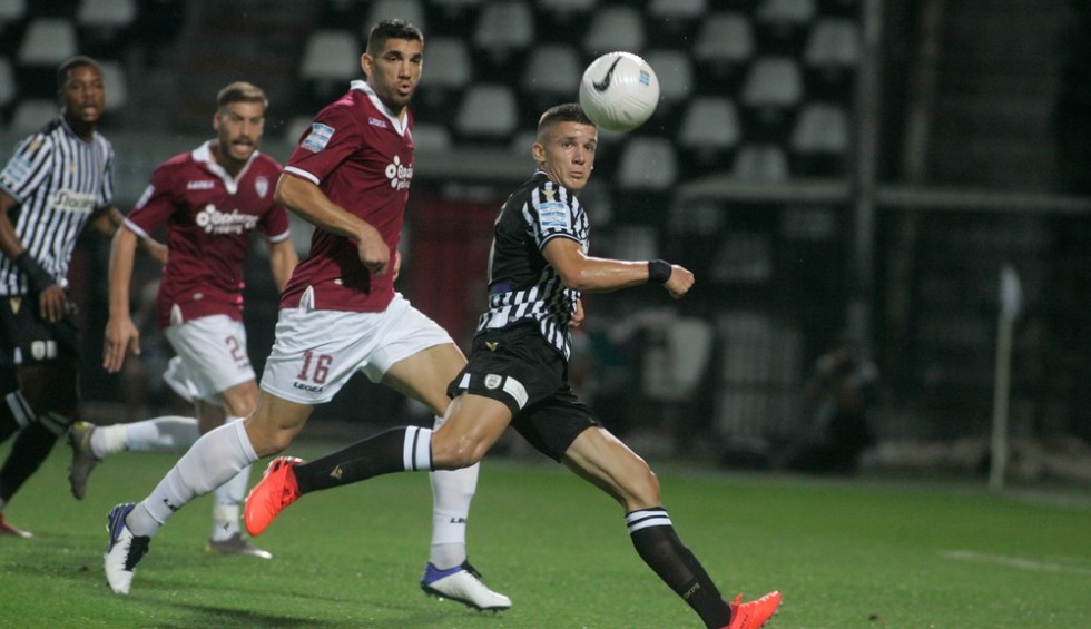 A generic square placeholder image with rounded corners in a figure.