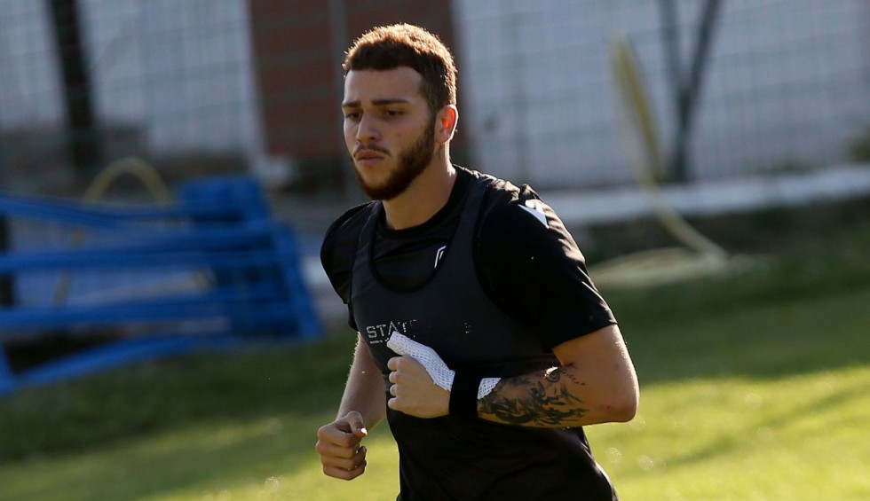 A generic square placeholder image with rounded corners in a figure.