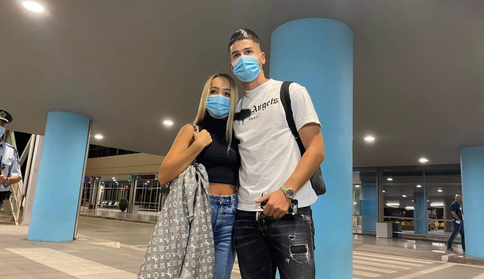 A generic square placeholder image with rounded corners in a figure.