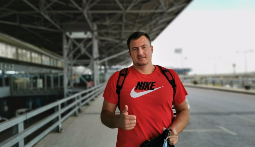 A generic square placeholder image with rounded corners in a figure.