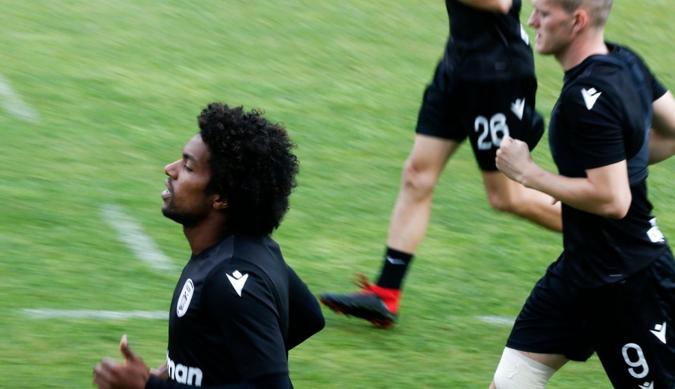 A generic square placeholder image with rounded corners in a figure.