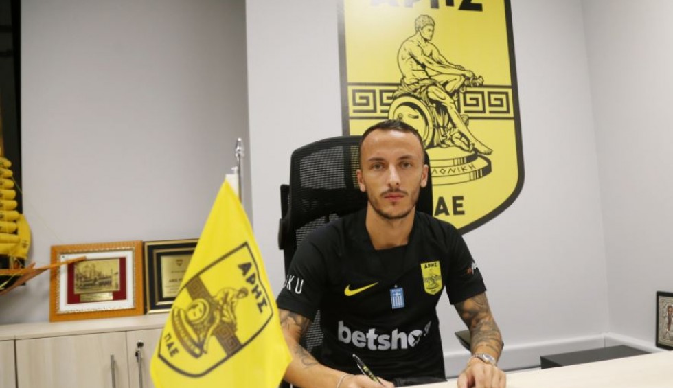 A generic square placeholder image with rounded corners in a figure.