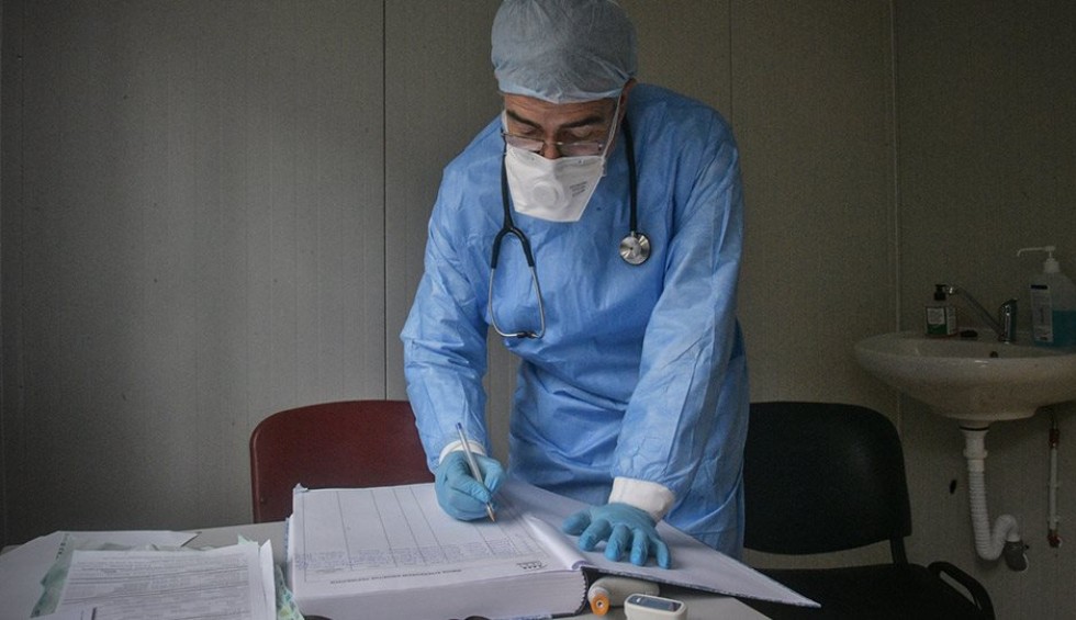 A generic square placeholder image with rounded corners in a figure.