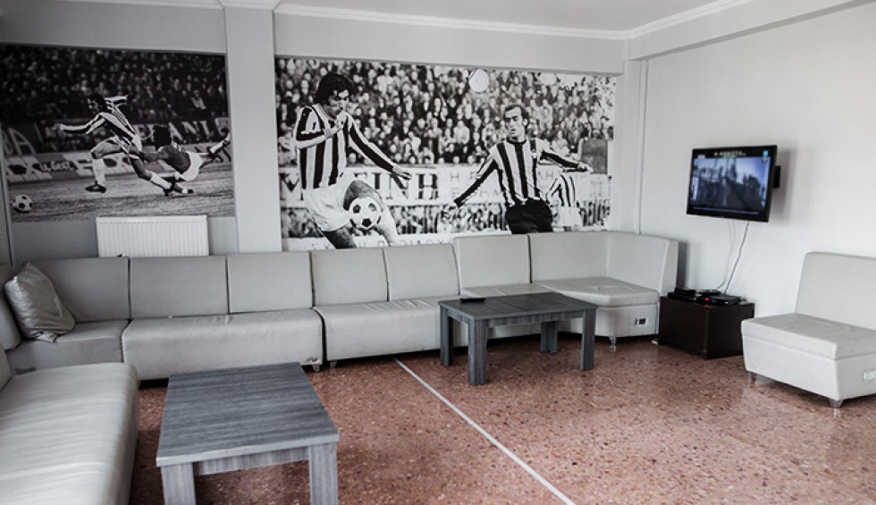 A generic square placeholder image with rounded corners in a figure.