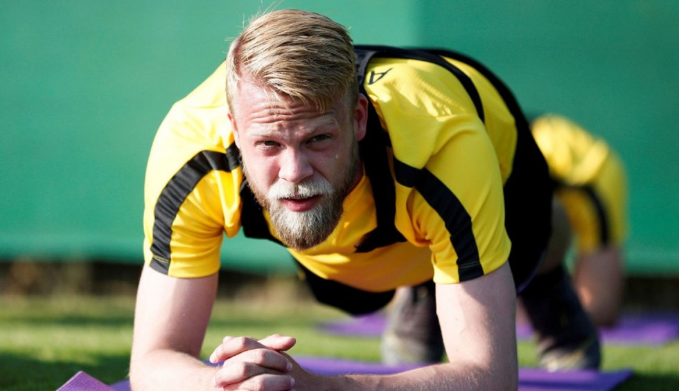 A generic square placeholder image with rounded corners in a figure.