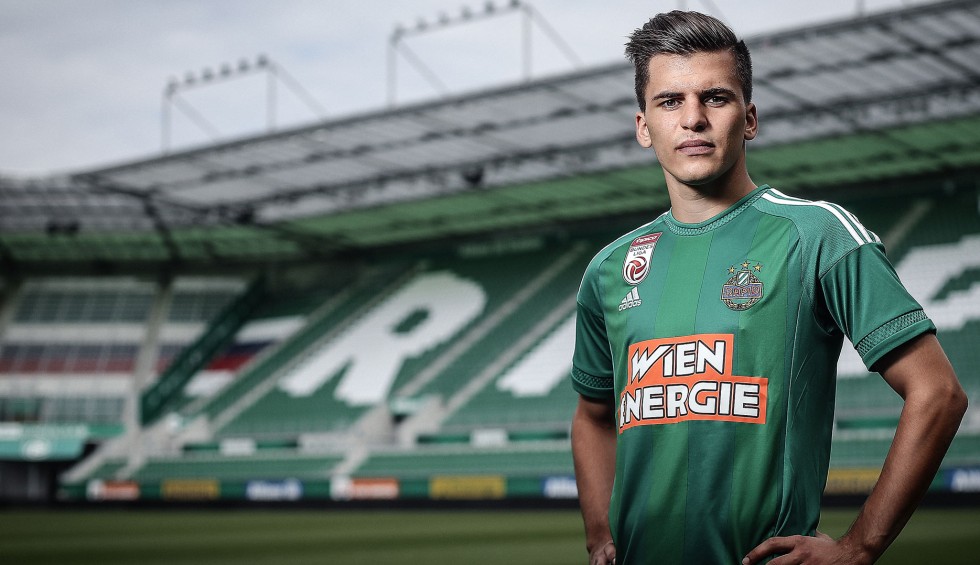 A generic square placeholder image with rounded corners in a figure.