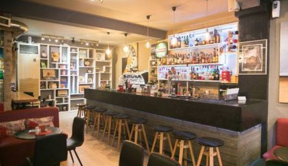 A generic square placeholder image with rounded corners in a figure.