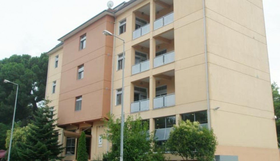 A generic square placeholder image with rounded corners in a figure.