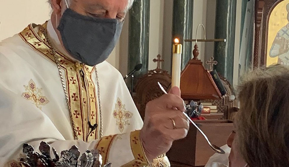 A generic square placeholder image with rounded corners in a figure.