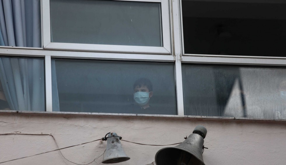 A generic square placeholder image with rounded corners in a figure.