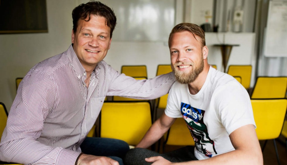 A generic square placeholder image with rounded corners in a figure.