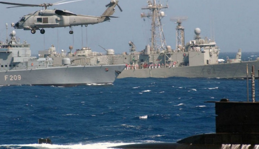 A generic square placeholder image with rounded corners in a figure.