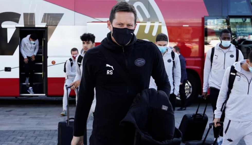 A generic square placeholder image with rounded corners in a figure.