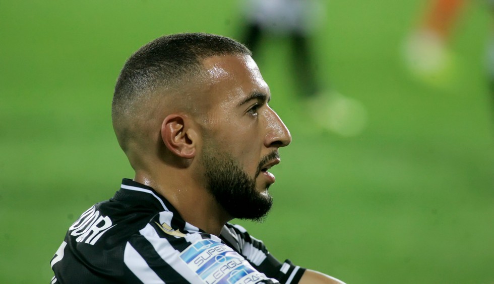 A generic square placeholder image with rounded corners in a figure.