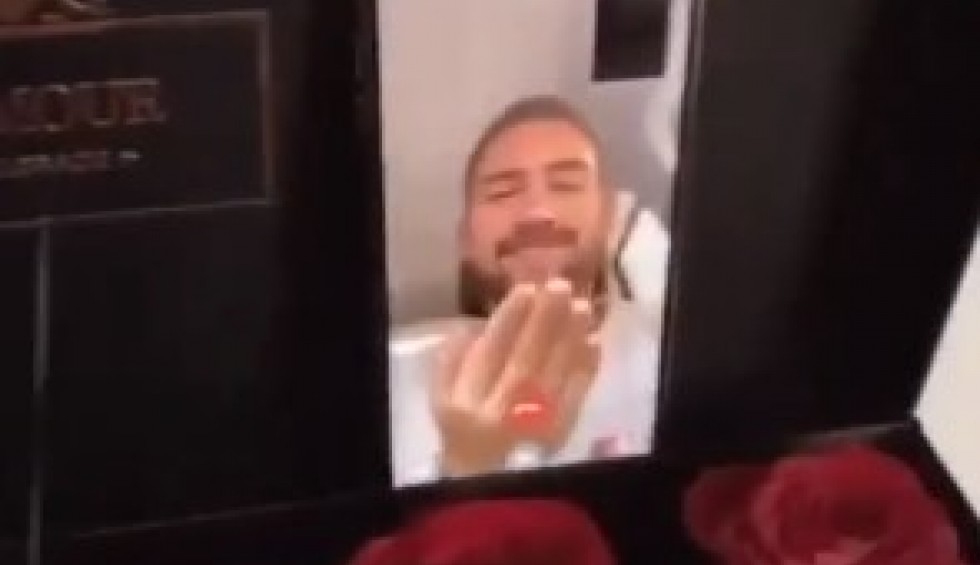 A generic square placeholder image with rounded corners in a figure.