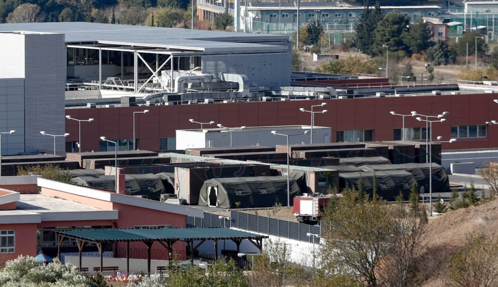 A generic square placeholder image with rounded corners in a figure.