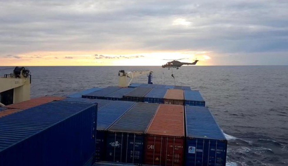 A generic square placeholder image with rounded corners in a figure.