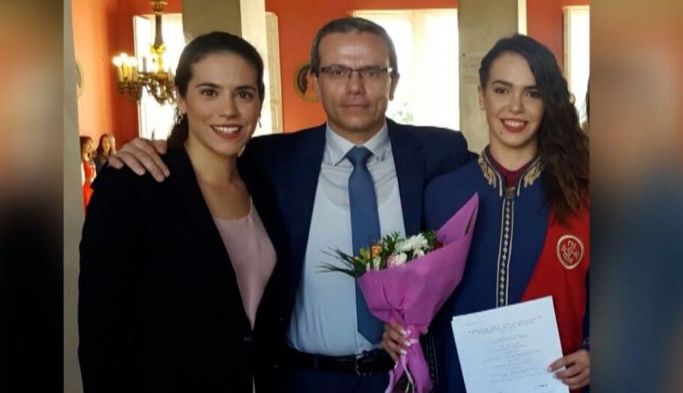 A generic square placeholder image with rounded corners in a figure.