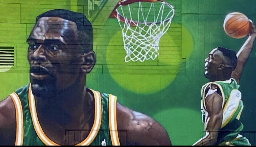 A generic square placeholder image with rounded corners in a figure.