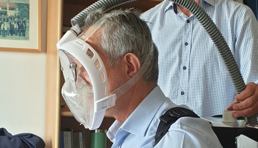 A generic square placeholder image with rounded corners in a figure.