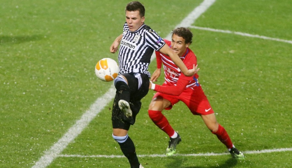 A generic square placeholder image with rounded corners in a figure.