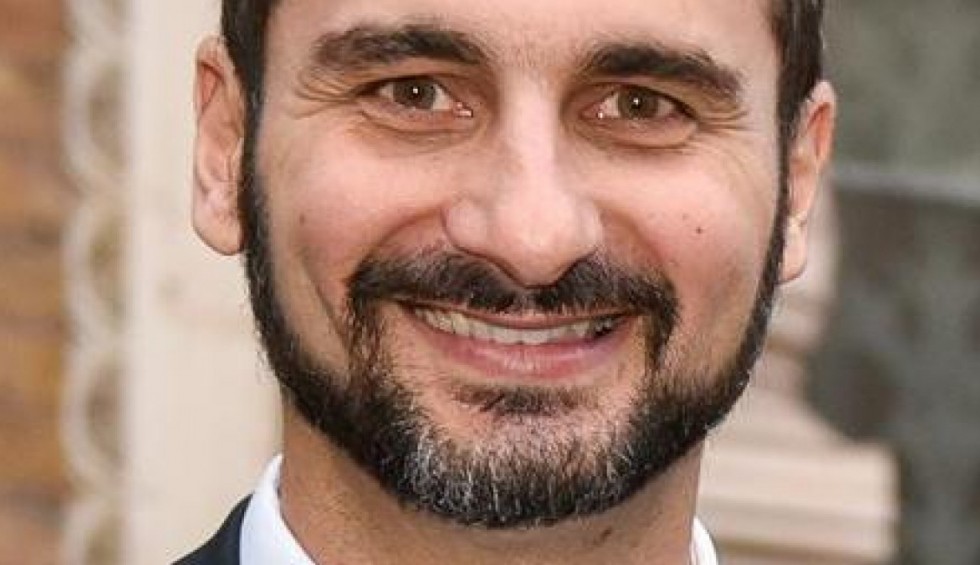 A generic square placeholder image with rounded corners in a figure.