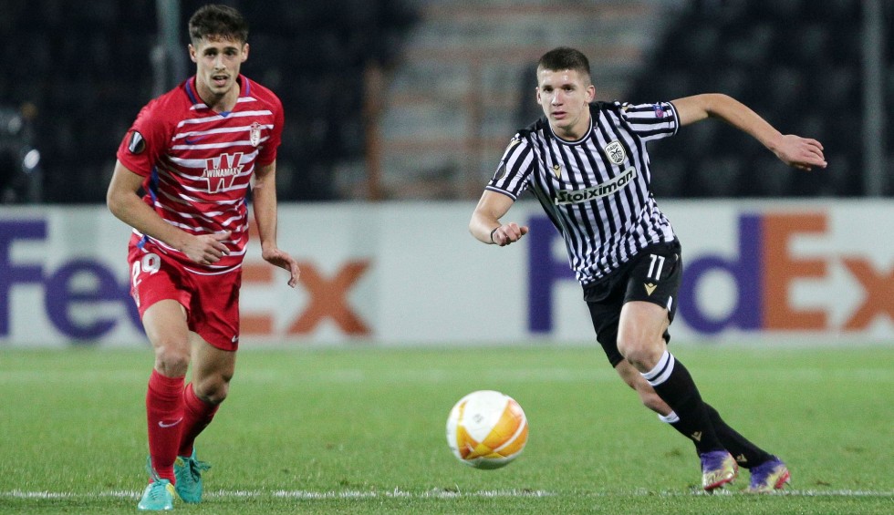 A generic square placeholder image with rounded corners in a figure.