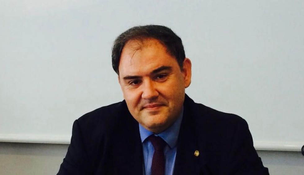 A generic square placeholder image with rounded corners in a figure.