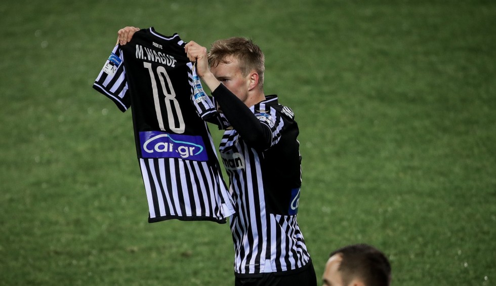 A generic square placeholder image with rounded corners in a figure.