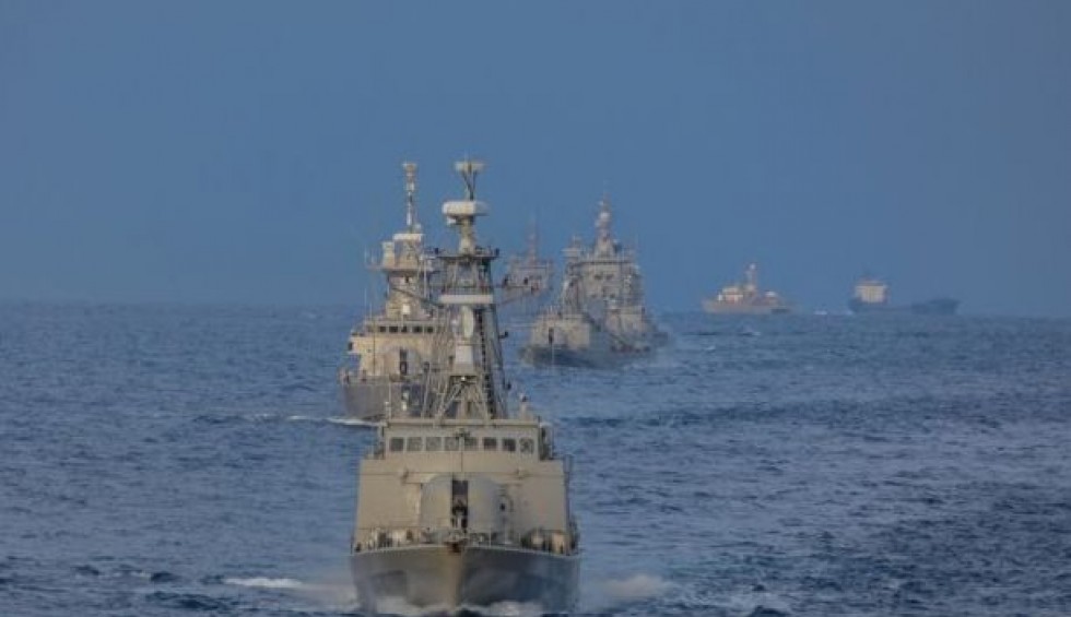 A generic square placeholder image with rounded corners in a figure.