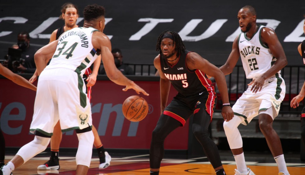 A generic square placeholder image with rounded corners in a figure.