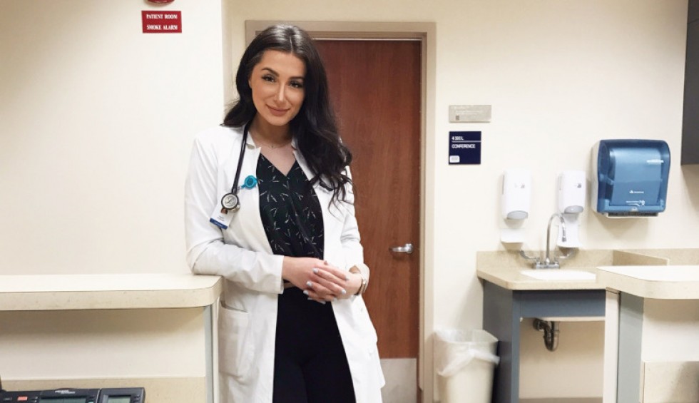 A generic square placeholder image with rounded corners in a figure.