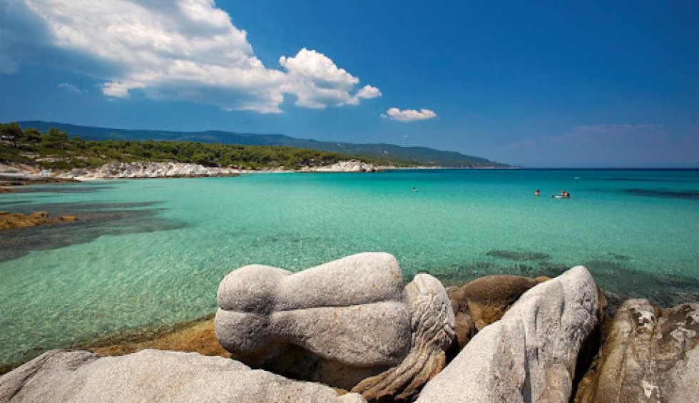 A generic square placeholder image with rounded corners in a figure.