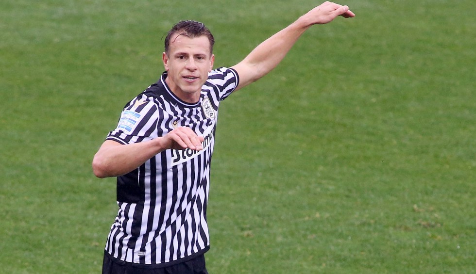 A generic square placeholder image with rounded corners in a figure.