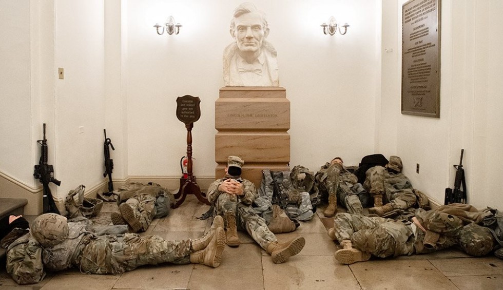 A generic square placeholder image with rounded corners in a figure.